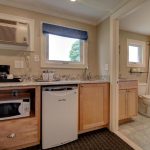 Counter with sink along back wall.