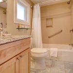 Private bathroom with shower and tub.