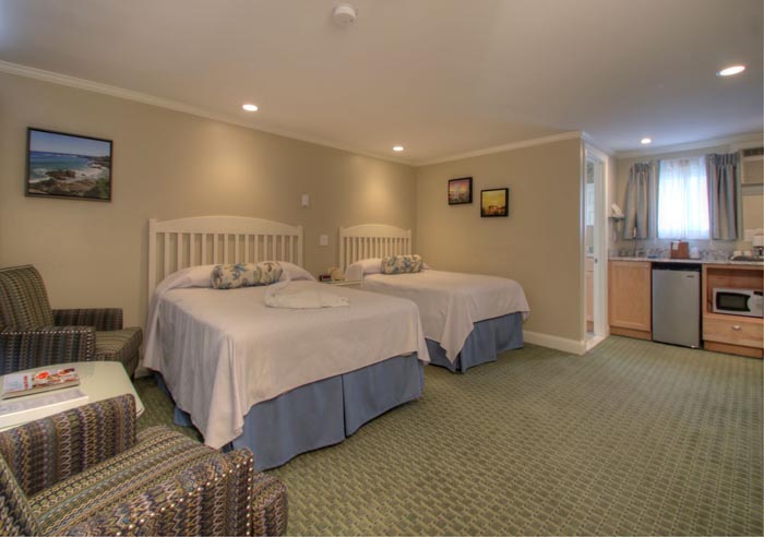 Spacious room with two queen beds.