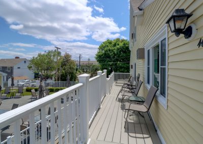 Private running deck with chairs.