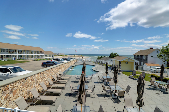 Overlooking pool and firepits.