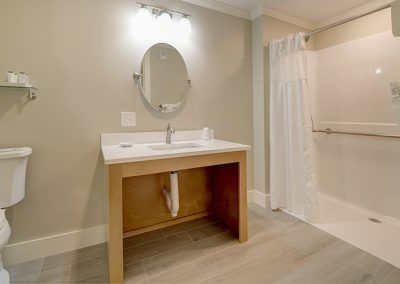 Room 78's bathroom with walk-in shower.