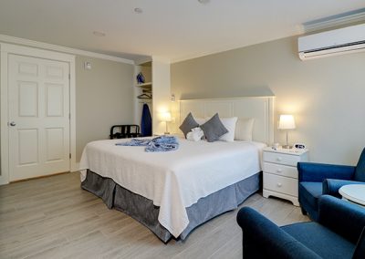 Room 78, view from door of bed and seating area.