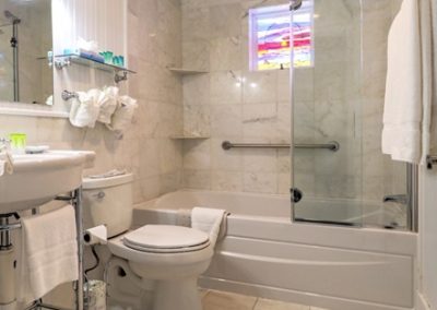 Private bath with shower and tub.