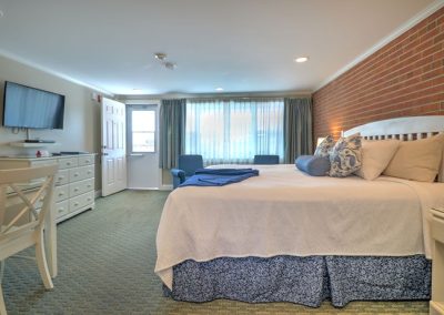 Open sleeping, seating, and entertainment area.