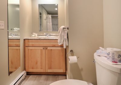Private bathroom, left of the door.